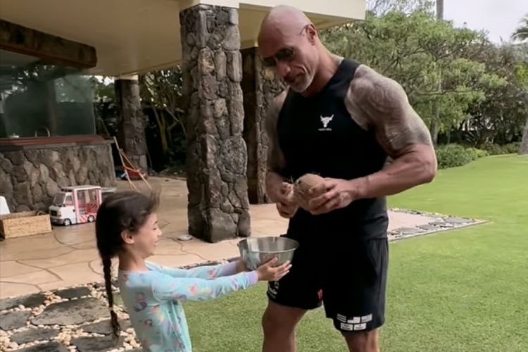 Dwayne Johnson Demonstrates How to Crack Open a Coconut with His Hands and a Rock on Easter [Video]
