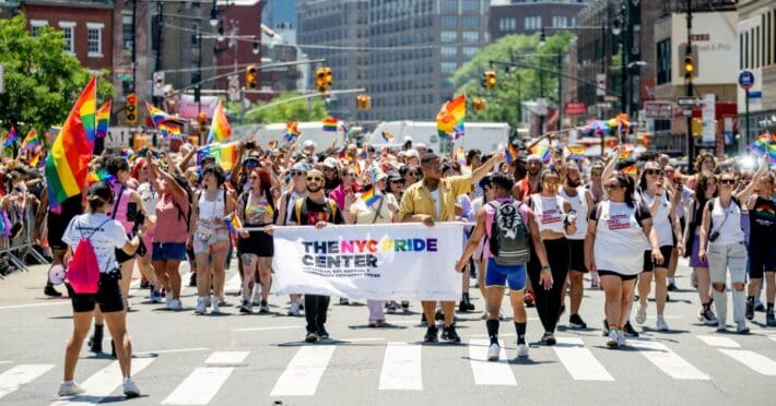 LGBTQIA+ folx celebrating pride parade.