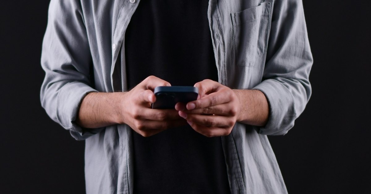 Man using iphone