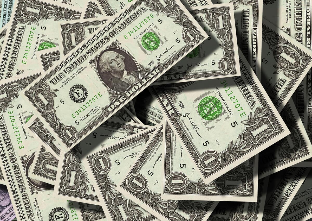 Money in a pile. Photo by Pixabay from Pexels: https://www.pexels.com/photo/1-us-bank-note-47344/