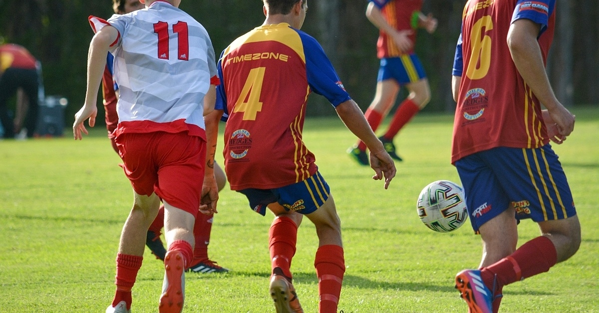 Athletes playing football