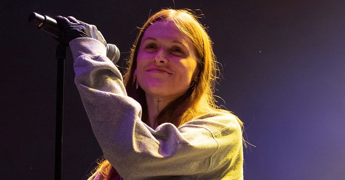 Ethel Cain performs on stage