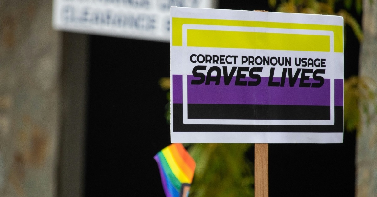 nonbinary protest sign