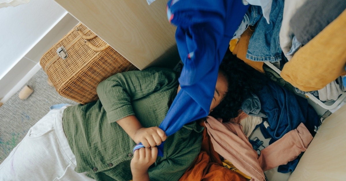 woman decluttering closet