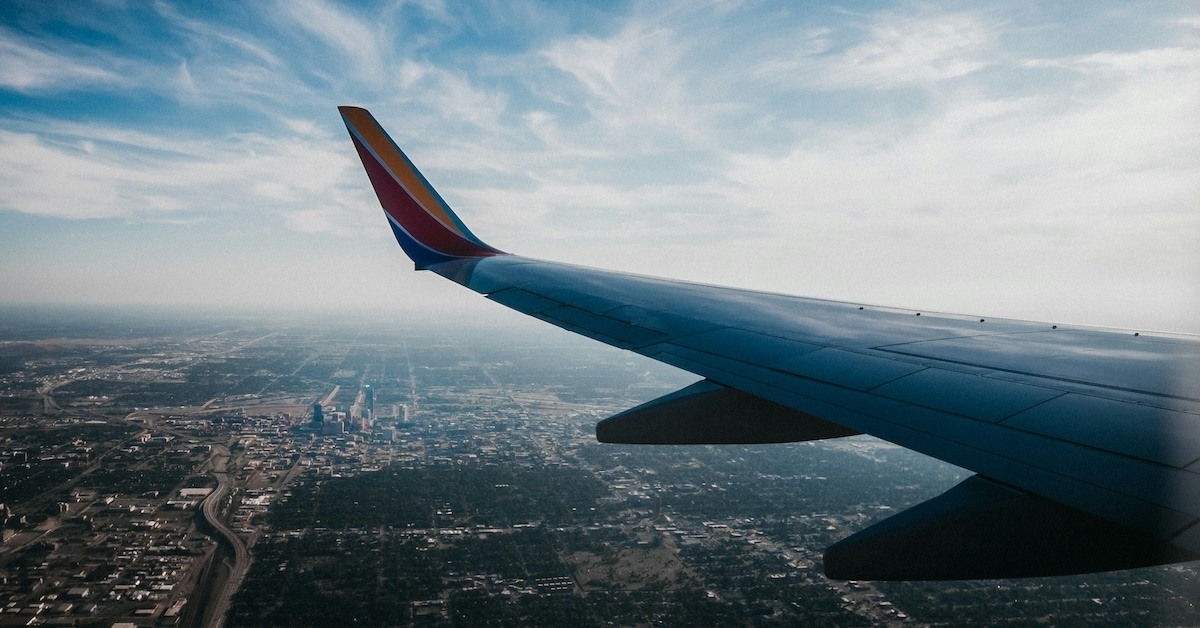 The wing of a plane during a flight.