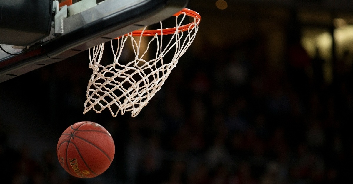 Basketball going into hoop