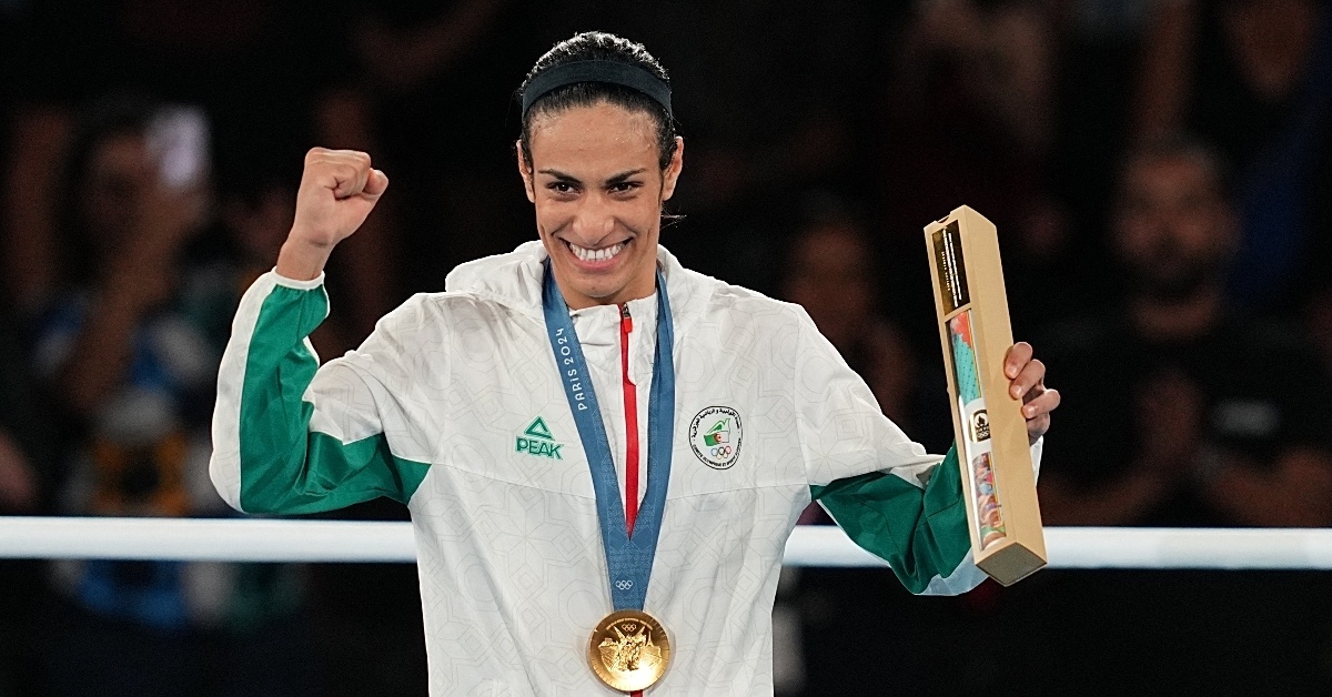 Imane Khelif (Algeria) celebrates gold on Day 14 of the Olympic Games at Roland Garros