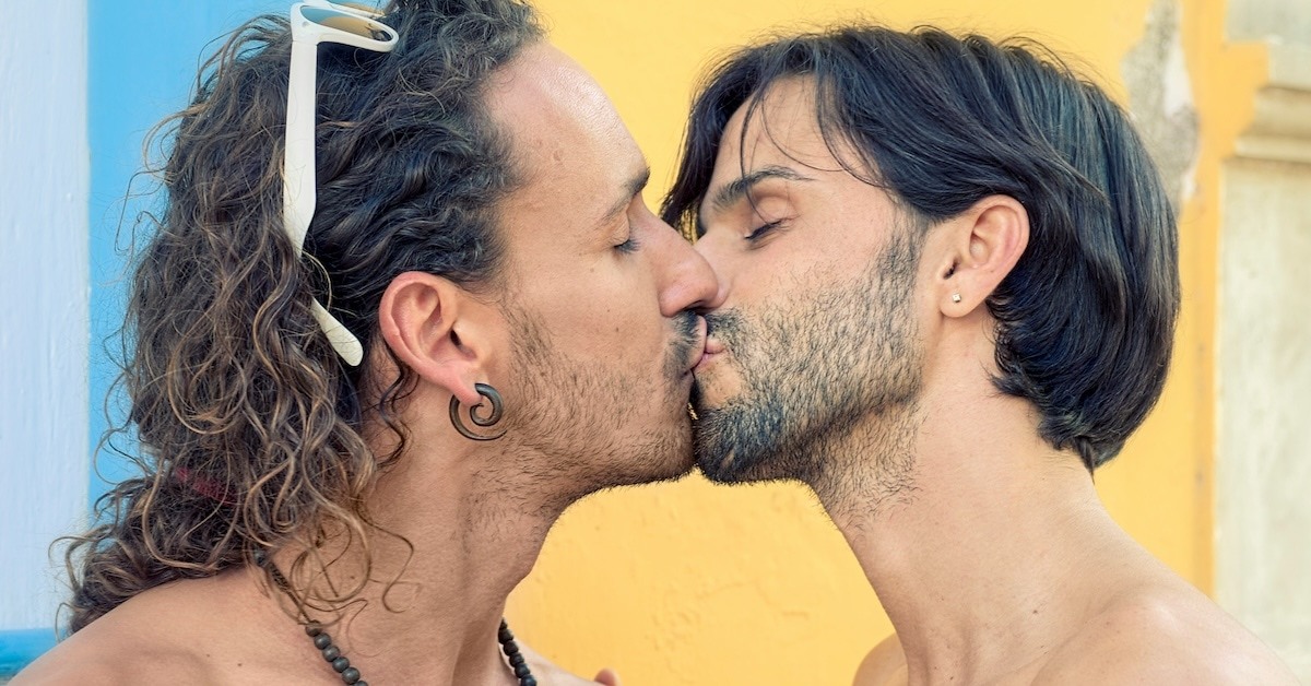 Two people kissing.