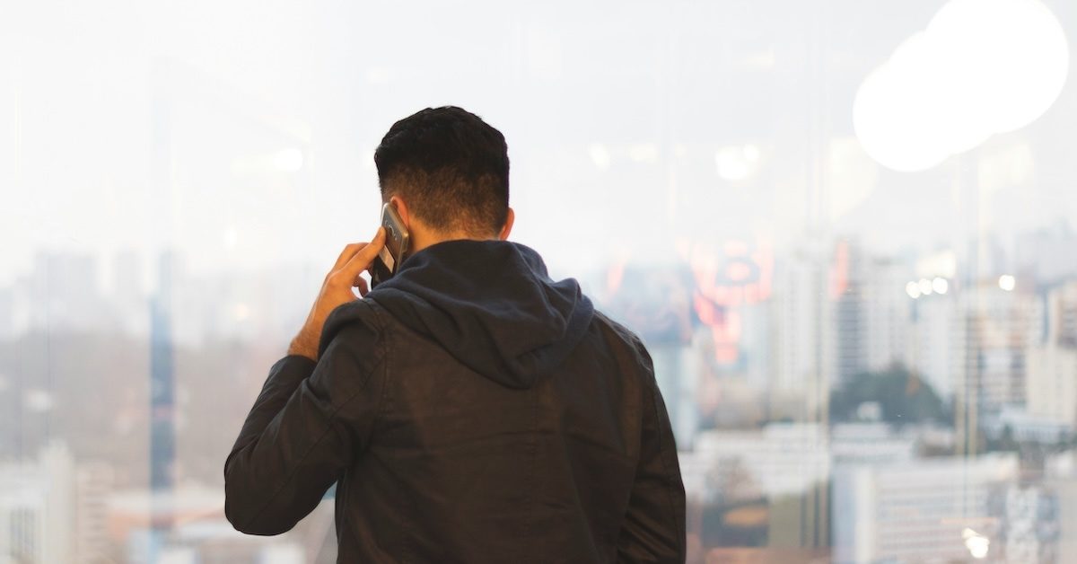 A person on the phone. 