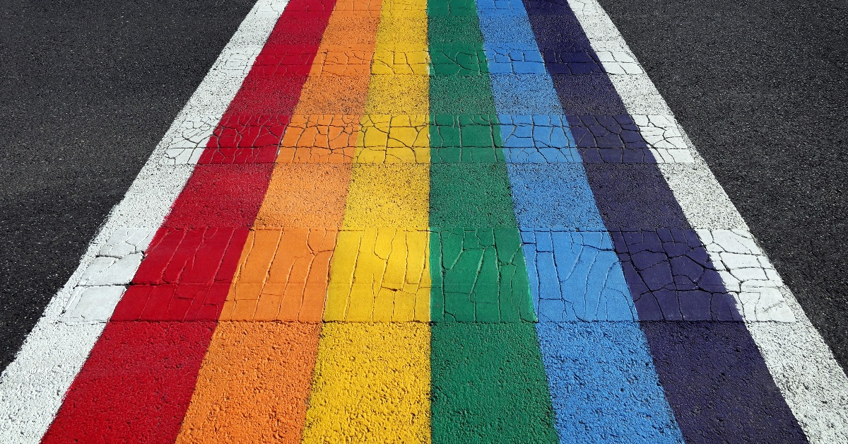 Rainbow painted on street walkway