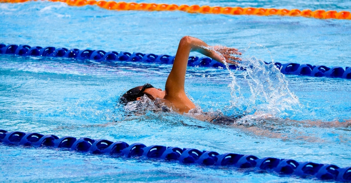 Woman competes as competitive swimmer (1)