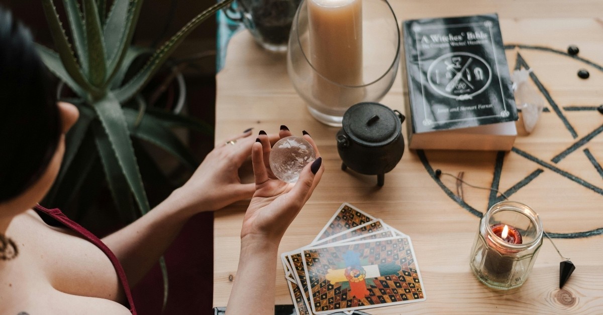 Crop fortune teller with crystal ball predicting fate at home