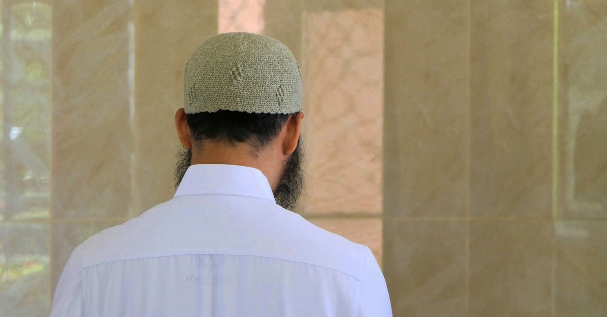 Man standing outside of temple