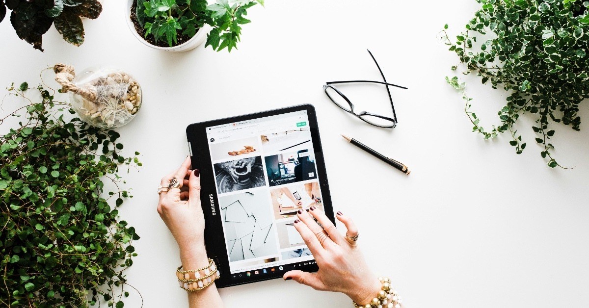 Person using black tablet computer