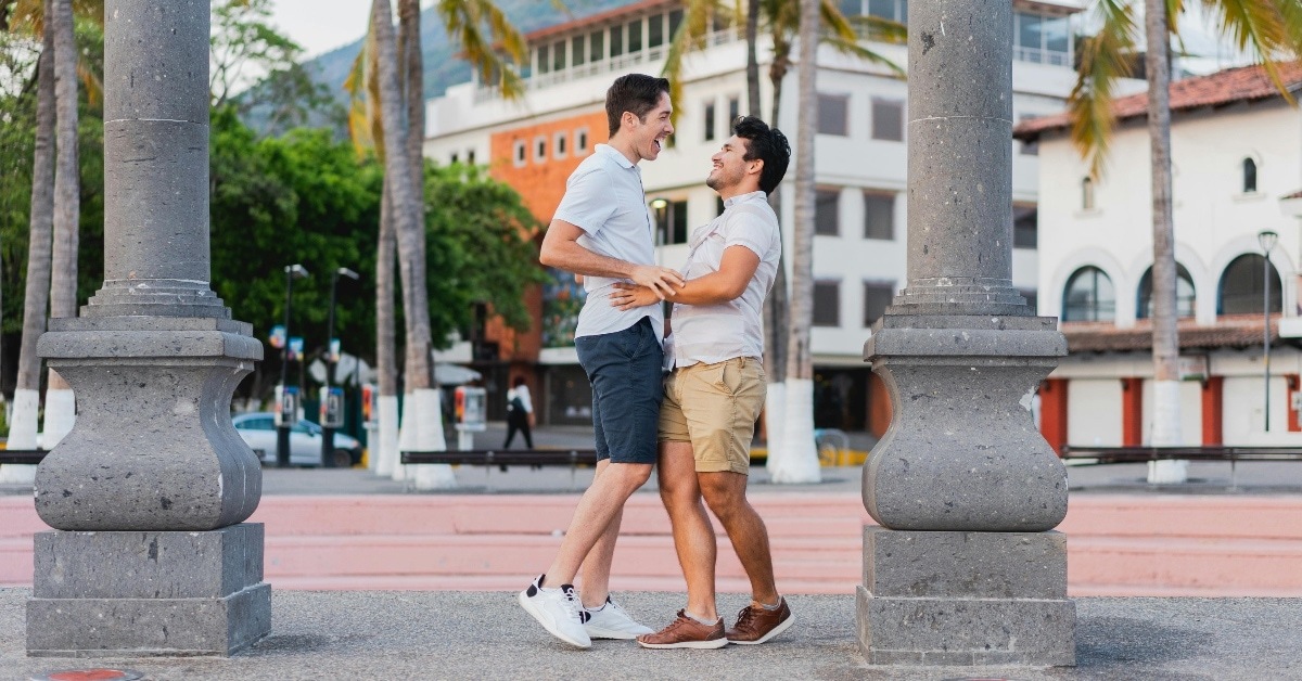 A Happy Couple Smiling at Each Other