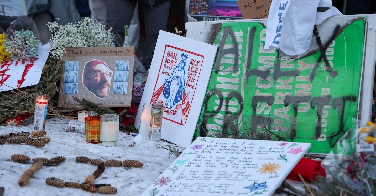 Signs honoring Alex Pretti. 