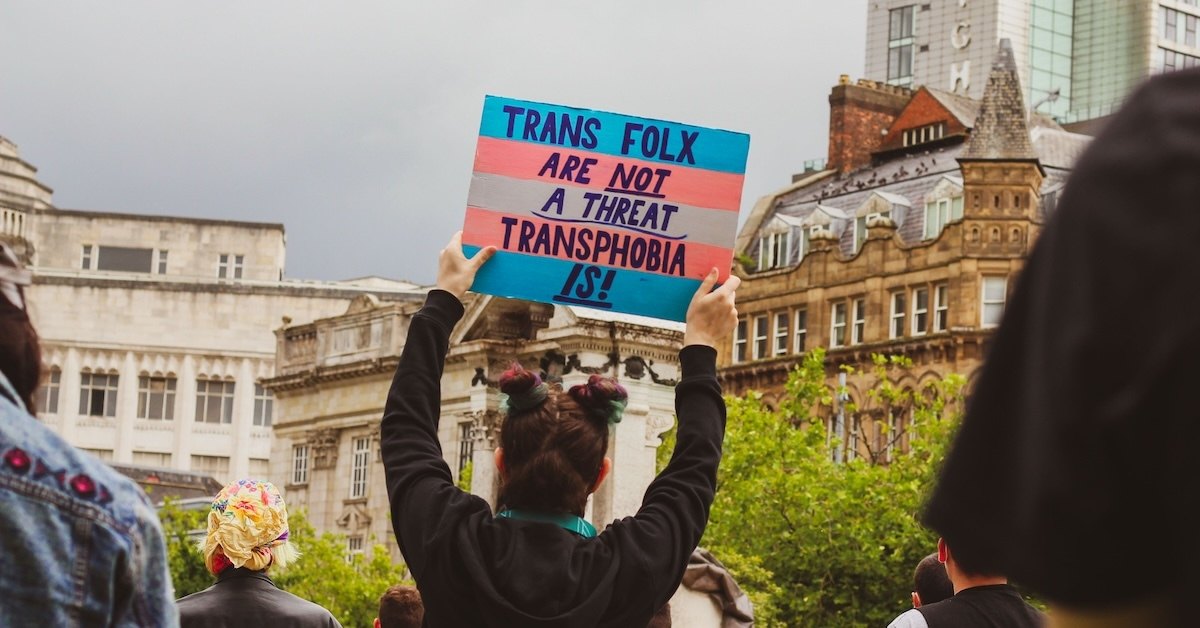 A sign that says: "Trans Folk Are Not A Threat, Transphobia Is."