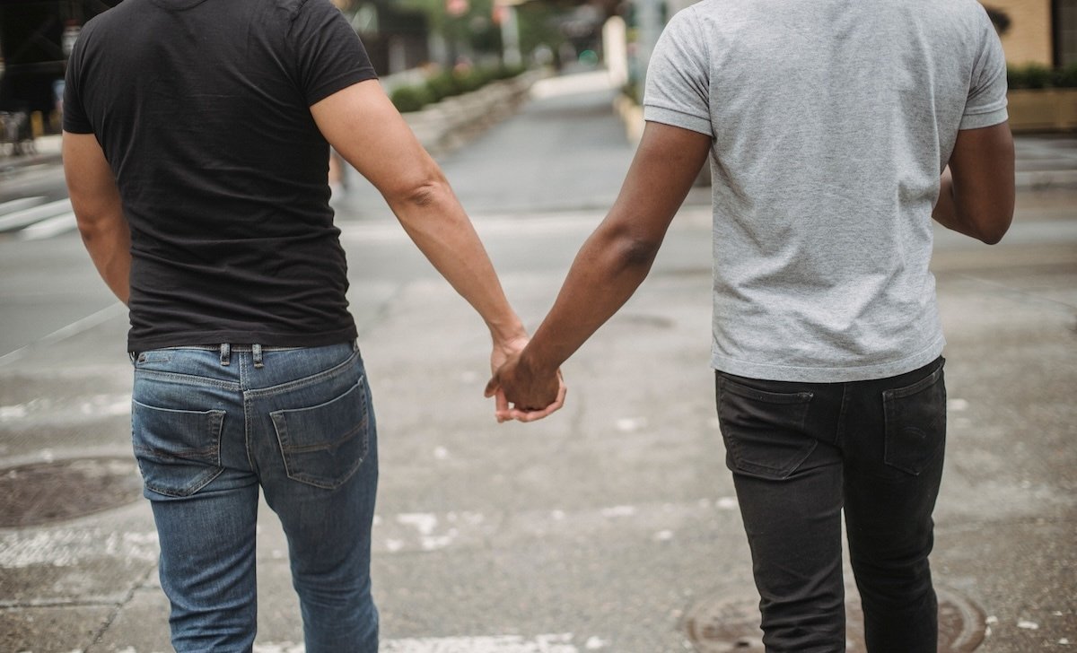 Two people holding hands.