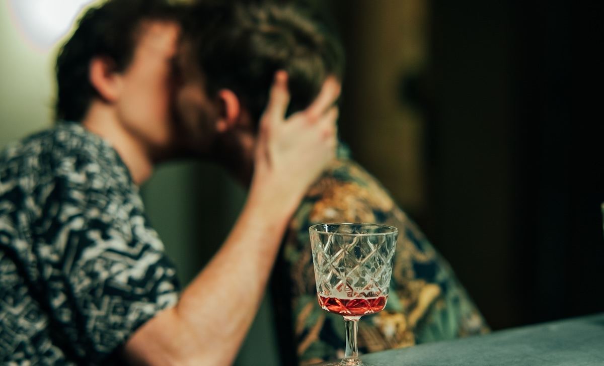 Two people kissing.
