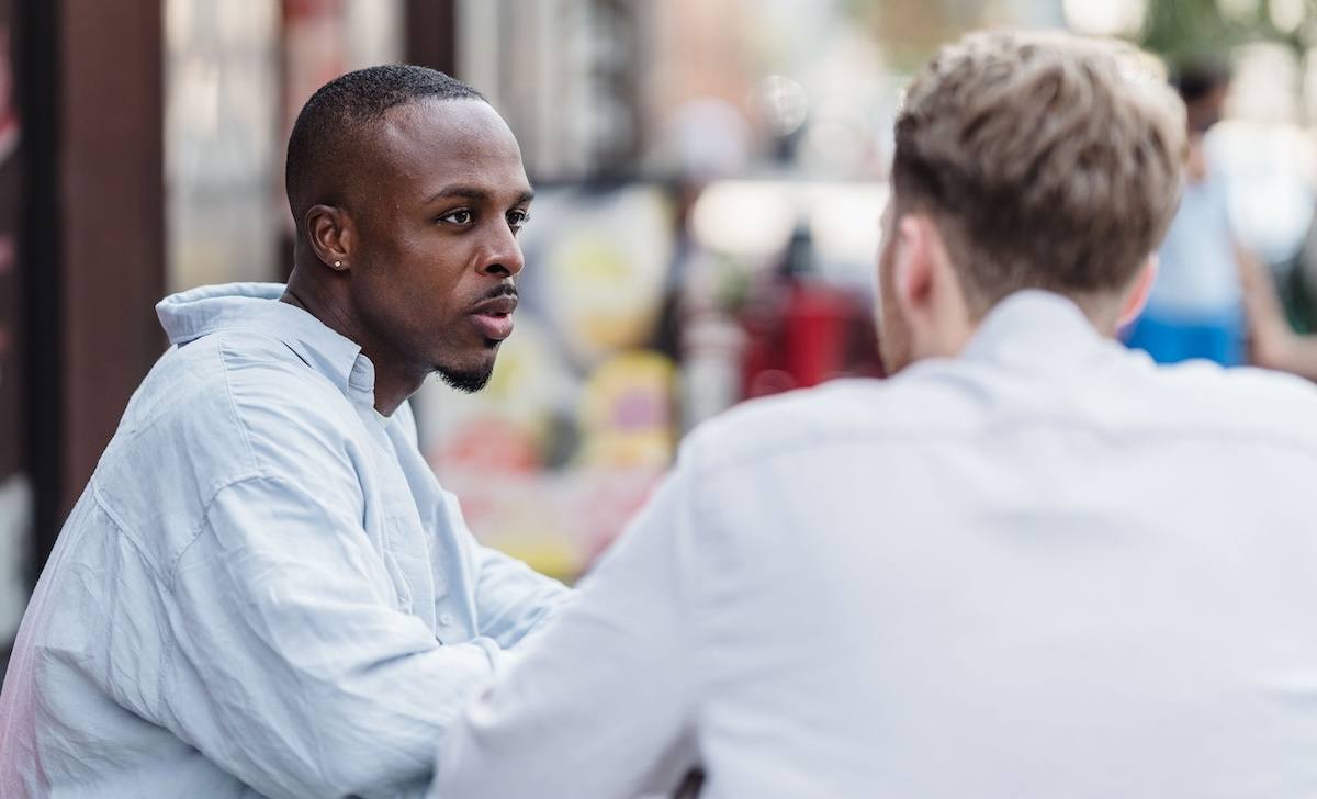 Two people talking. 
